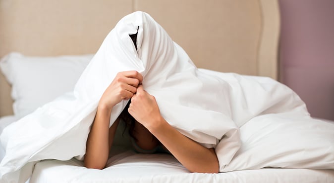 Person covering head with sheet, Better Sleep Council