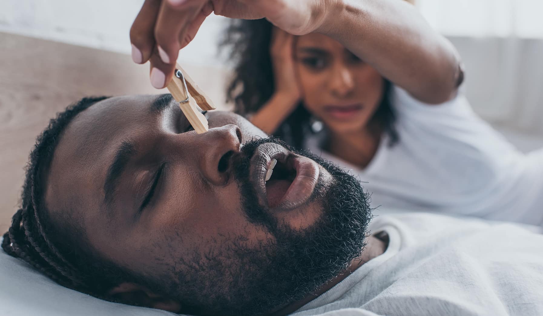 Discover six home remedies that will help you soothe snoring while you sleep.