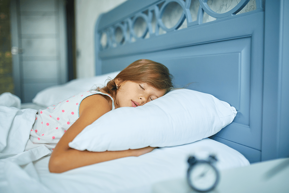 little-girl-sleeping-on-a-big-and-cozy-bed-white-l-2022-01-19-00-21-39-utc