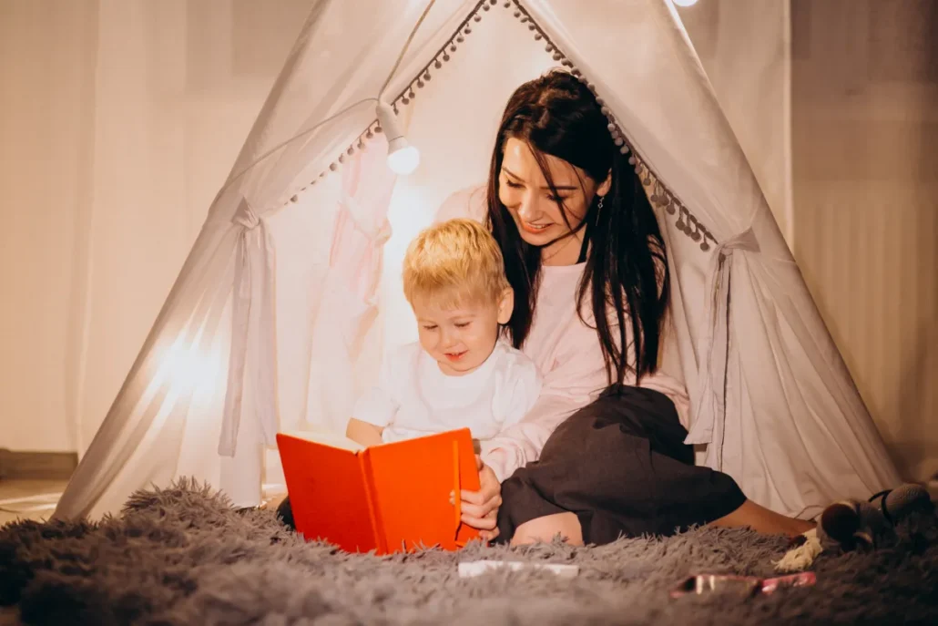 Parent telling a bedtime story to a calm child in a dimly lit bedroom
